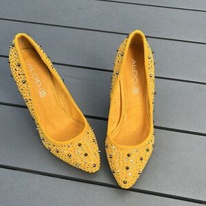 ALDO yellow studded pumps